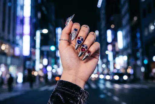 Silver Stiletto Nails With Jeweled Hearts