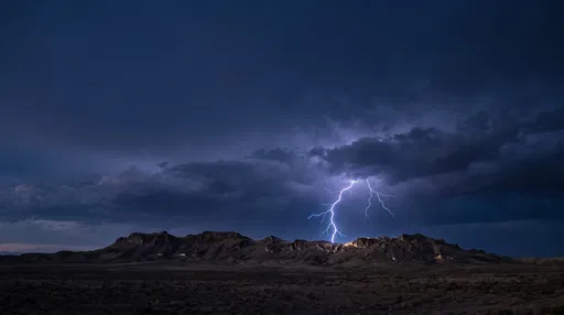 Lightning Strike Over Desert Mountain Ridge