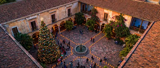 Colonial Courtyard with Christmas Tree and Luminarias