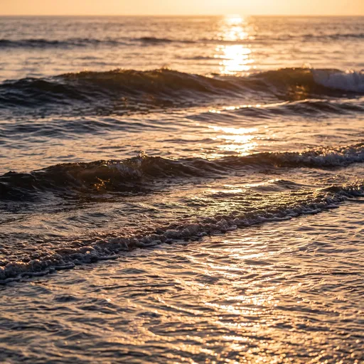 Golden Sunset Over Gentle Ocean Waves