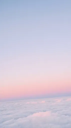 Pastel Sunset Sky Above Clouds