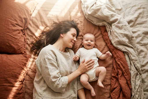 Mother and Baby on Linen Bed