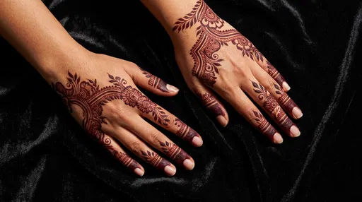 Hands with Arabic Mehndi on Black Velvet