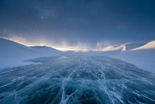 Cracked Blue Ice and Snow Dunes