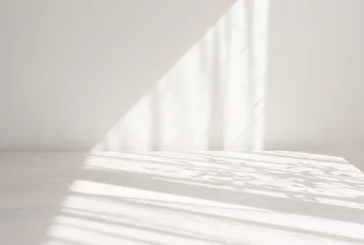 White Wood Tabletop With Sunlight Shadows