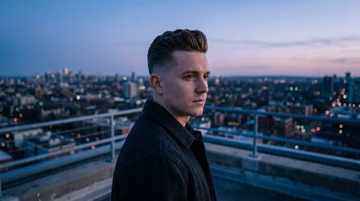 Man on Urban Rooftop at Dusk