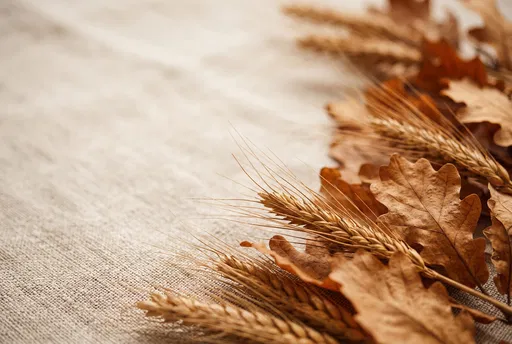 Dried Wheat and Oak Leaves on Linen