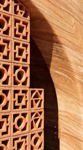 Terracotta Breeze Blocks and Curved Sandstone Wall