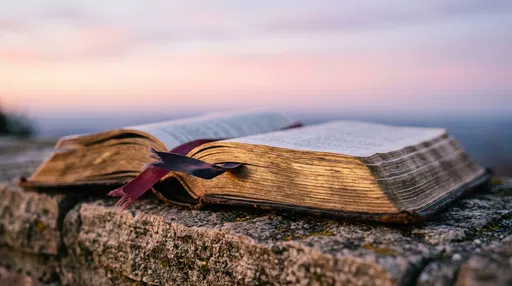 Open Antique Bible on Stone Ledge