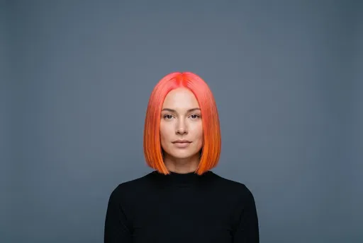 Woman with Vibrant Coral Orange Bob