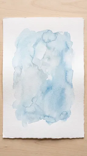 Soft Blue Watercolor Wash on Paper