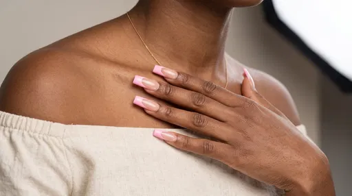 Woman With Pastel Pink French Tip Nails