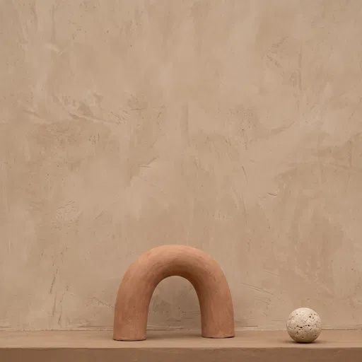 Minimalist Terracotta Arch and Travertine Sphere