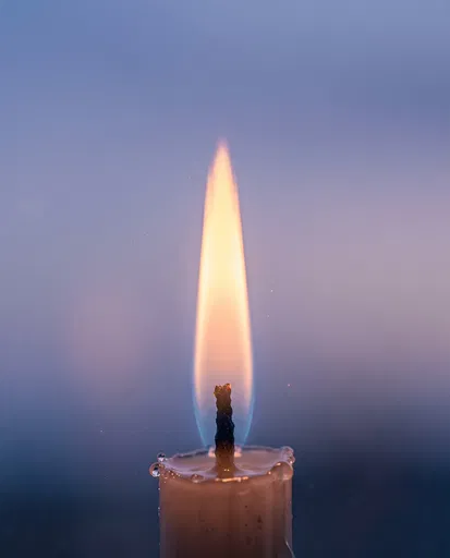 Macro Close-Up of Glowing Candle Flame