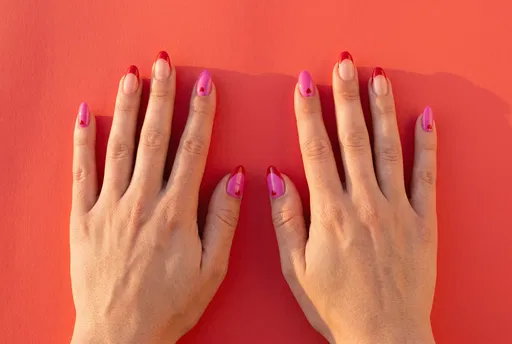 Hands With Red And Pink Valentine Manicure