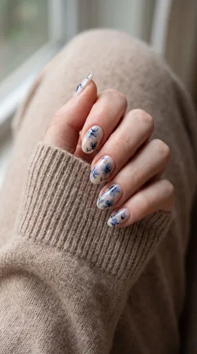 Blue Floral Watercolor Manicure With Beige Sweater