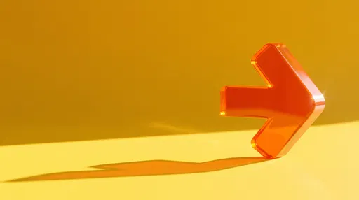 Translucent Orange Acrylic Arrow on Yellow Surface