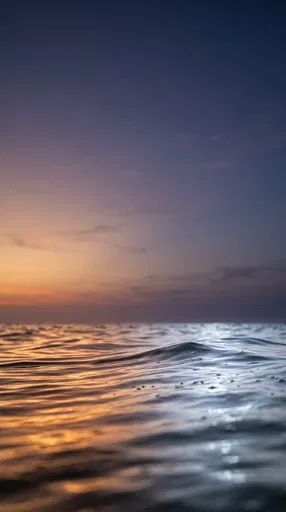Twilight Ocean Swells With Sunset Reflection