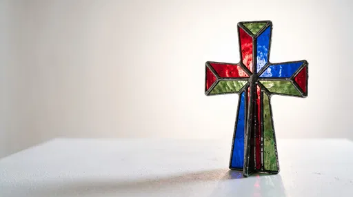 Stained Glass Christian Cross on White Surface