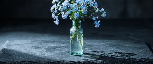 Blue Forget-Me-Nots in Glass Bottle