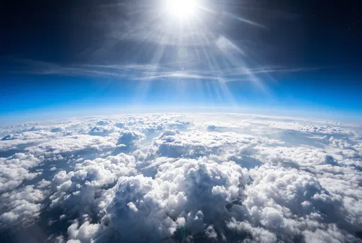 Sunlight Beaming Over High Altitude Clouds