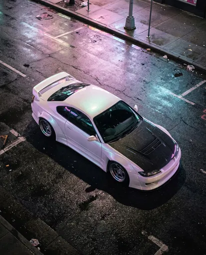 White Tuner Coupe on Wet Night Street