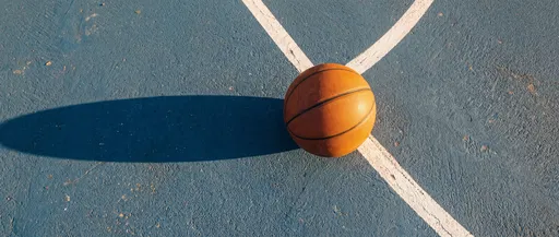 Basketball on Blue Outdoor Court