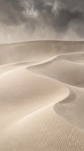 Minimalist Beige Sand Dunes Under Stormy Sky