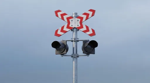 Red and White Railroad Crossing Sign