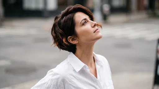 Woman With Short Chestnut Hair Looking Up