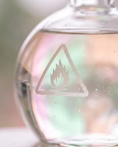 Glass Bottle With Frosted Flammable Warning Symbol