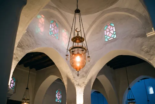 Glowing Mosque Lamp Under Whitewashed Arches