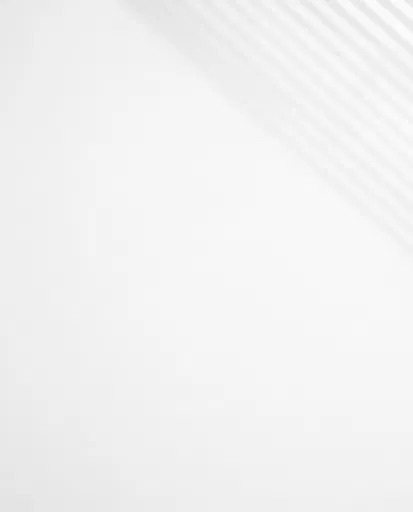 White Surface With Window Blind Shadows
