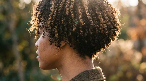 Profile Portrait of Woman with Curly Bob