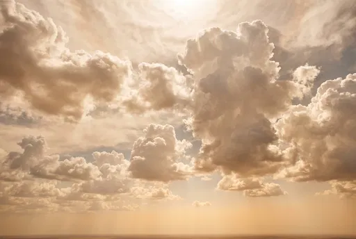 Warm Golden Cumulus Cloudscape Over Horizon