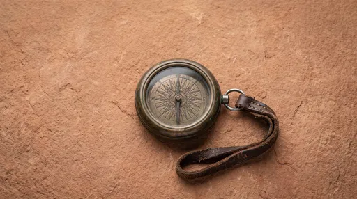 Antique Bronze Compass on Terracotta Stone
