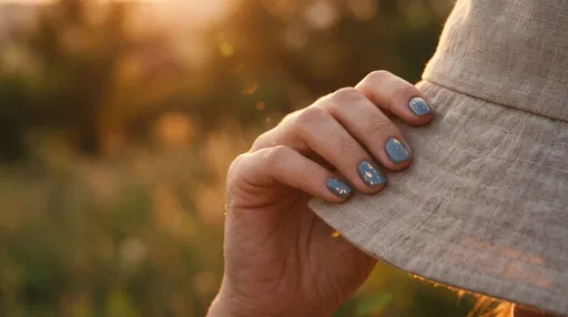 Hand with Blue Gold Nail Art