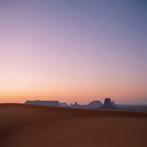 Minimalist Desert Dusk Over Distant Mesas