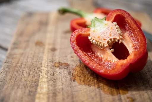 Sliced Red Pepper on Wooden Board