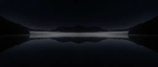 Dark Symmetrical Mountain Lake With Mist
