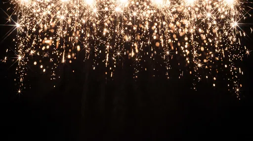 Golden Cascading Sparks on Black Background
