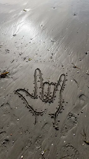 ASL I Love You Drawn in Sand