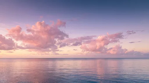 Pastel Pink Clouds Over Calm Ocean