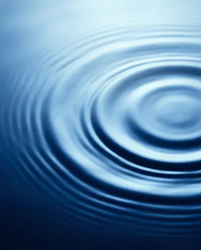 Concentric Blue Water Ripples Abstract