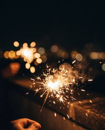 Glowing Gold Sparkler at Night
