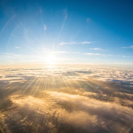 Aerial View Above Golden Clouds