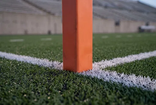 Orange Football Pylon on Turf Field