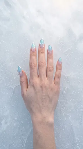 Hand With Glacial Blue Winter Nail Art