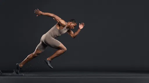 Male Sprinter Launching From Starting Blocks