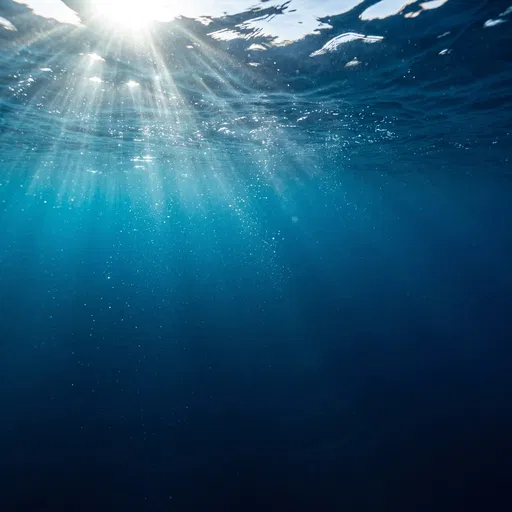 Deep Blue Underwater Ocean Sunbeams Background